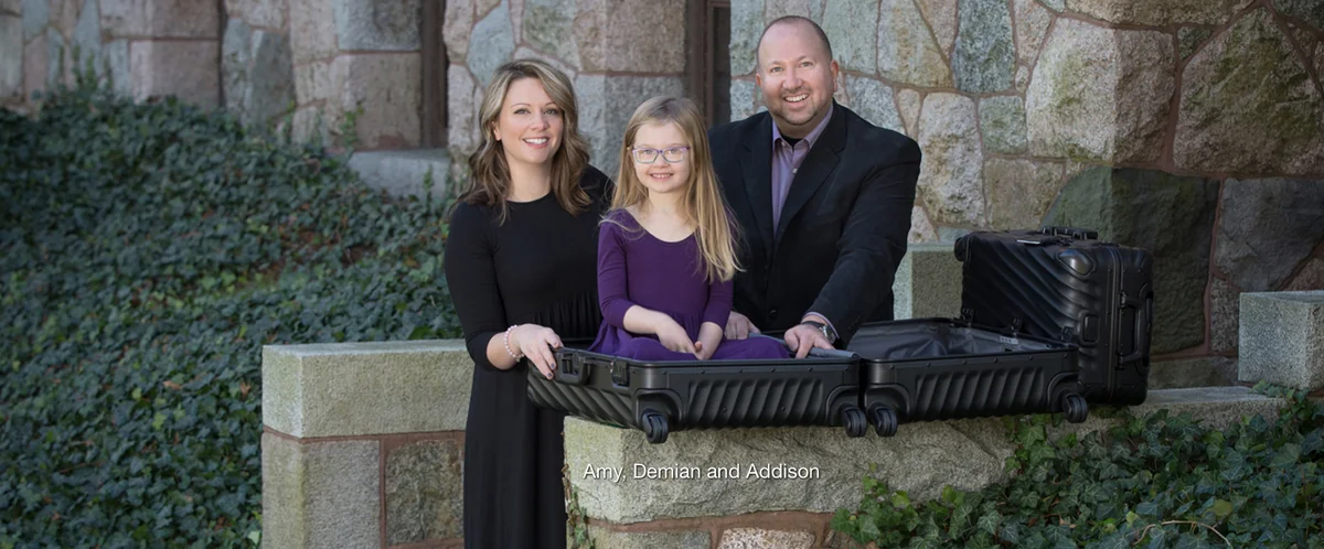 Co-owners Amy Lynch and Demian Wendrow with their daughter Addison and TUMI luggage